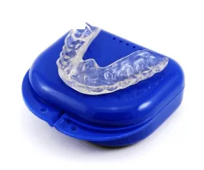 Hybrid Night Guard — clear custom dental night guard shown with its case